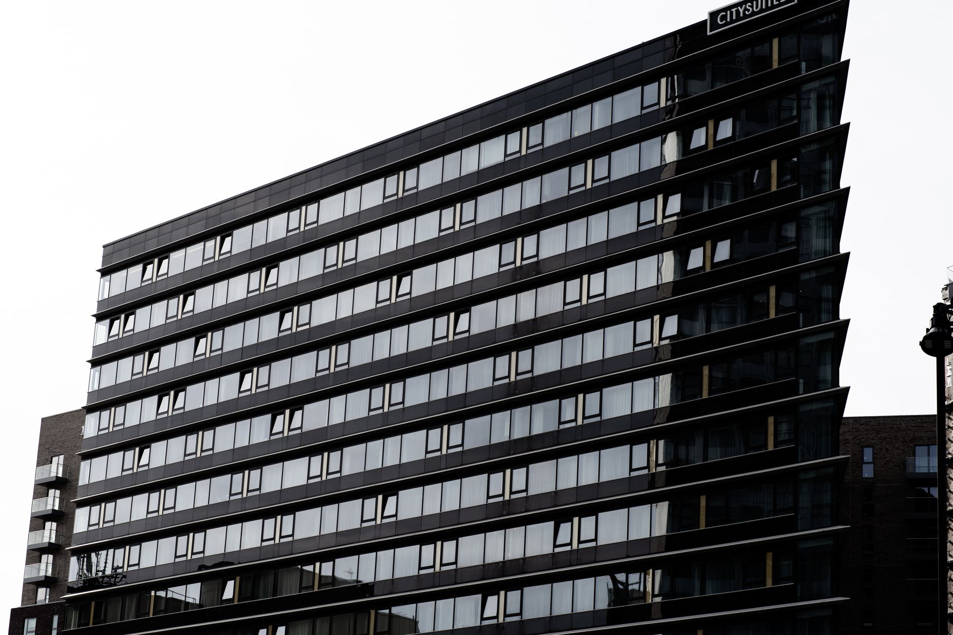 Energy assessor surveying a commercial building interior